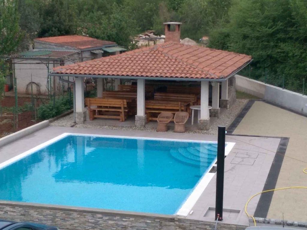 Ferienwohnung mit Gemeinschaftspool und Klimaanlage
