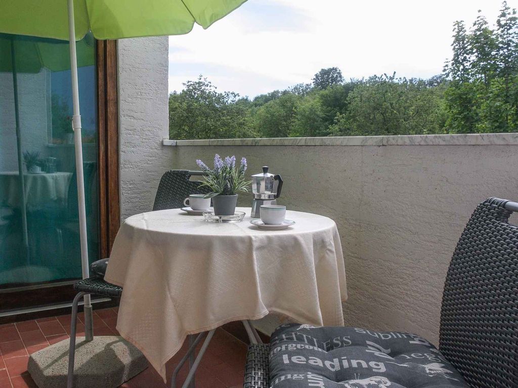Ferienwohnung mit Gemeinschaftspool und Klimaanlage