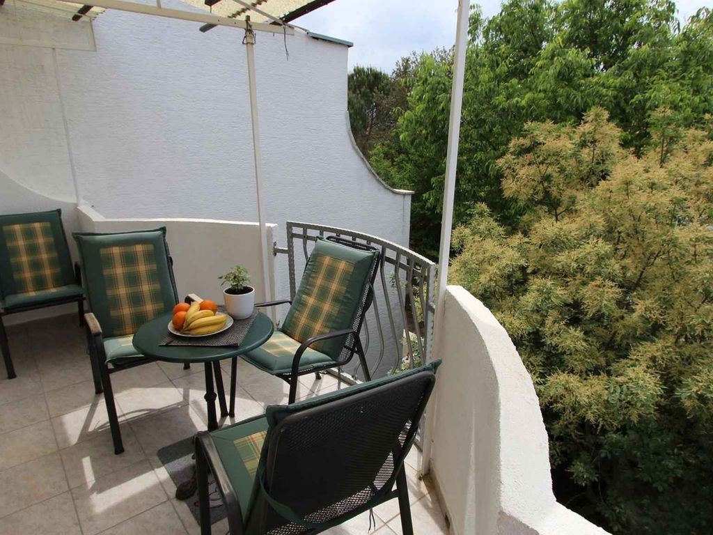 Ferienwohnung mit Klimaanlage und Balkon