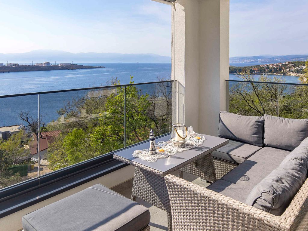 Ferienwohnung mit Garten, Balkon und Meerblick