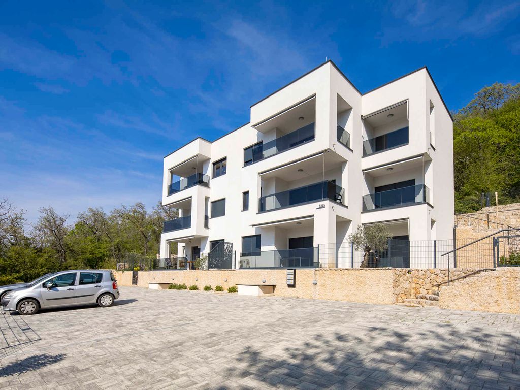 Ferienwohnung mit Garten, Balkon und Meerblick