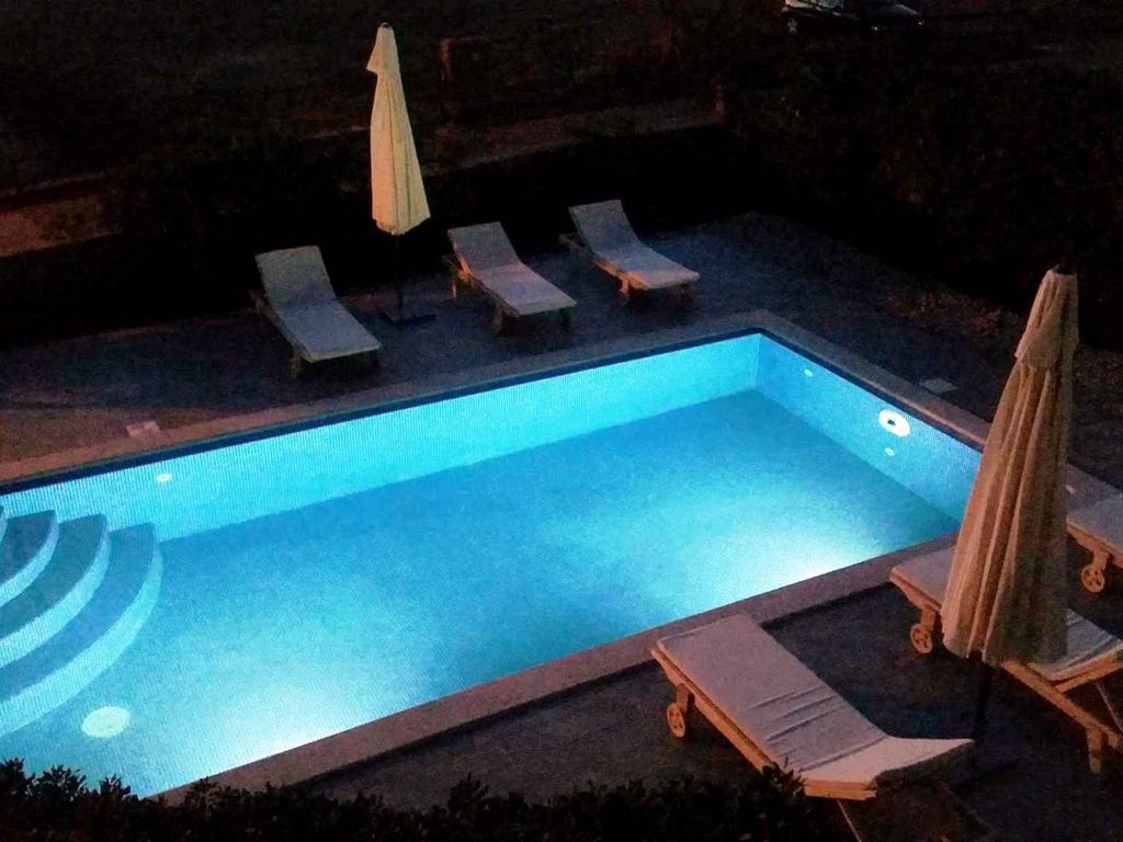 Ferienwohnung mit Poolnutzung und Terrasse