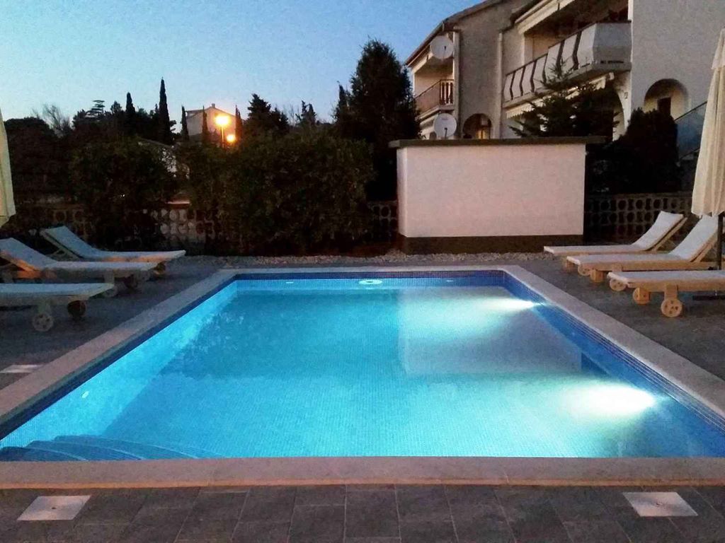 Ferienwohnung mit Poolnutzung und Terrasse