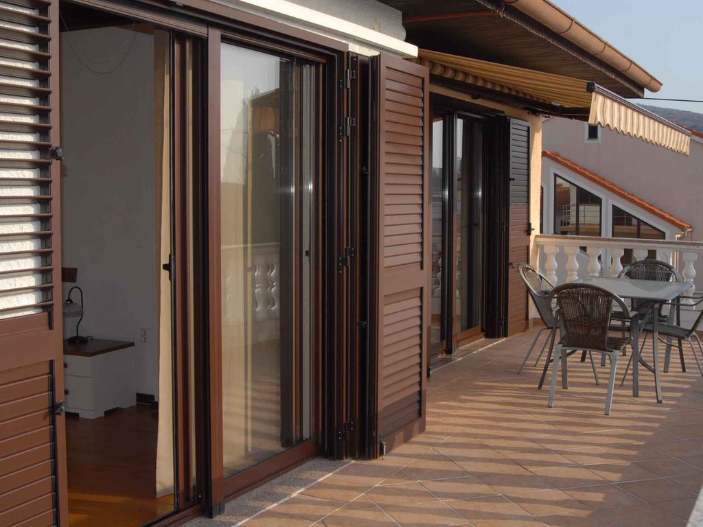 Ferienwohnung mit Poolnutzung und Balkon