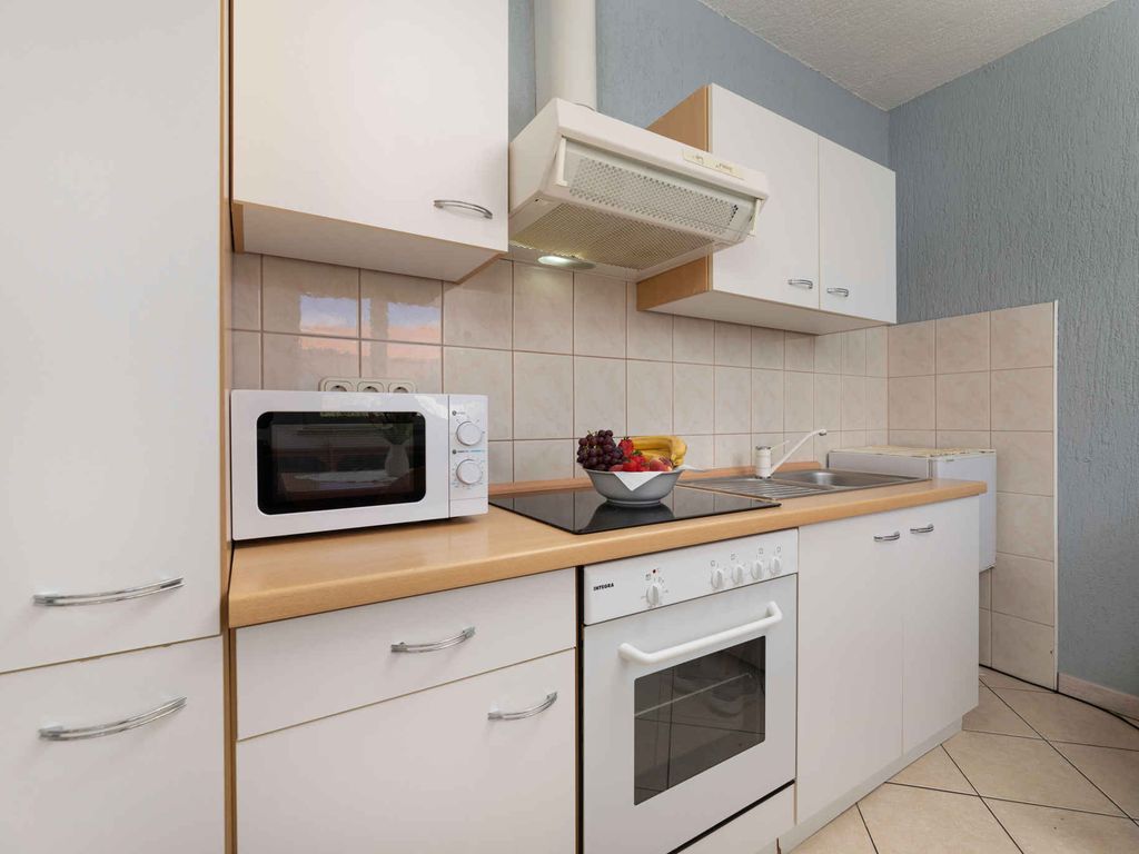 Ferienwohnung mit Balkon und Klimaanlage