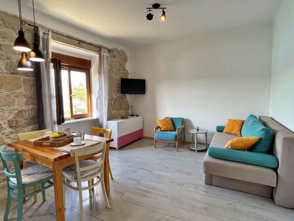 Ferienwohnung mit gemütlicher Terrasse und Meerblick