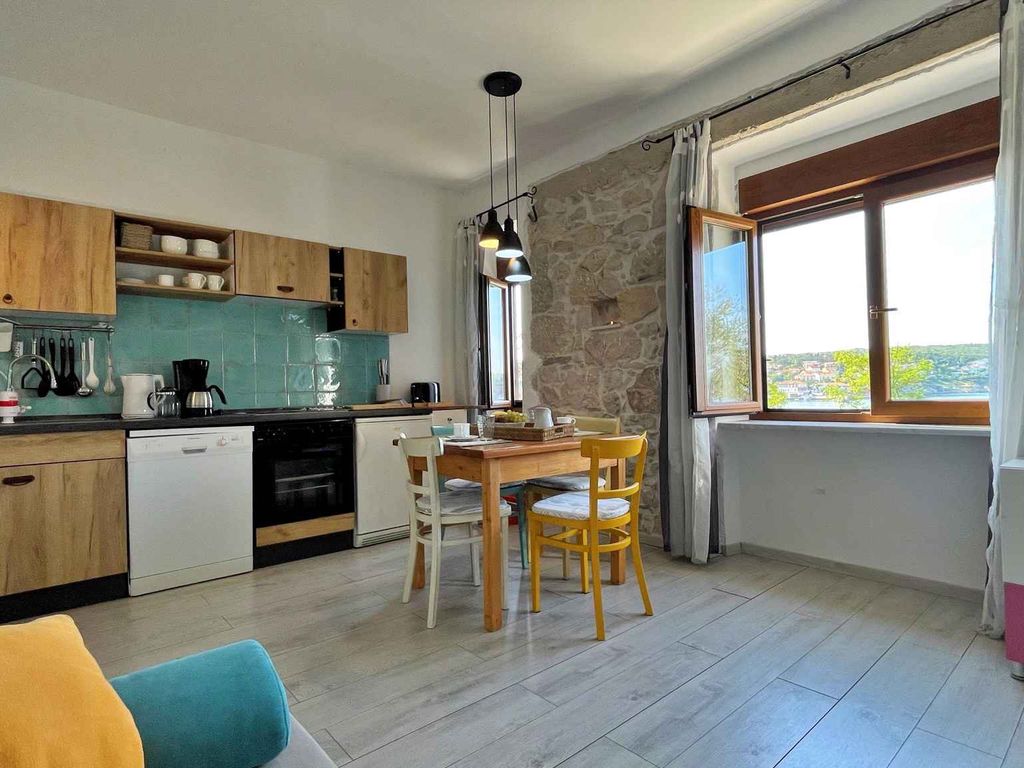 Ferienwohnung mit gemütlicher Terrasse und Meerblick