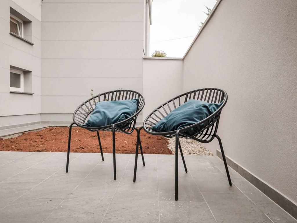 Ferienwohnung mit Swimmingpool und Grill zur gemeinsamen Nutzung
