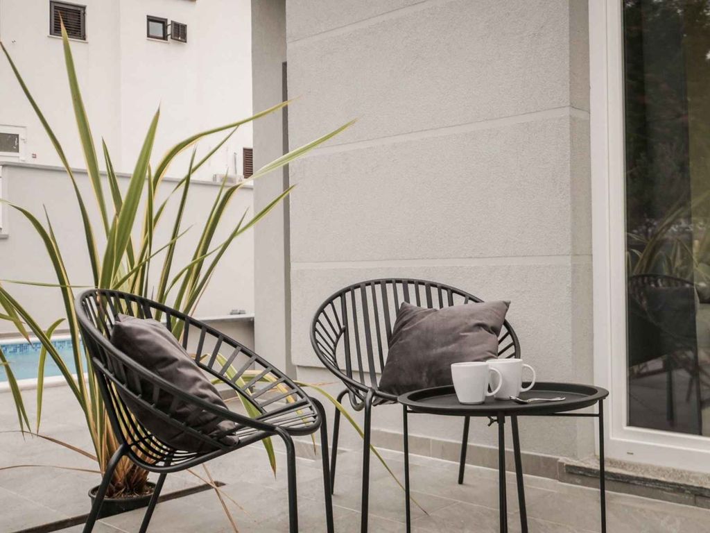 Ferienwohnung mit Swimmingpool und Grill zur gemeinsamen Nutzung