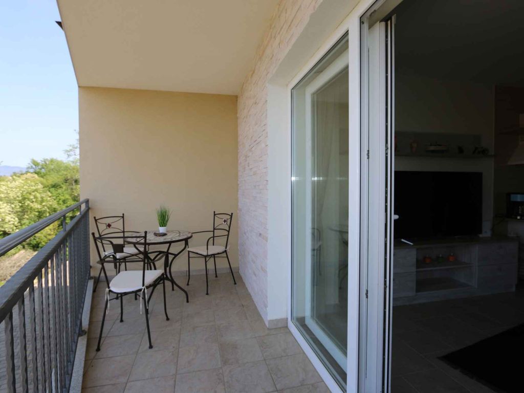 Ferienwohnung mit Klimaanlage und seitlichem Meerblick