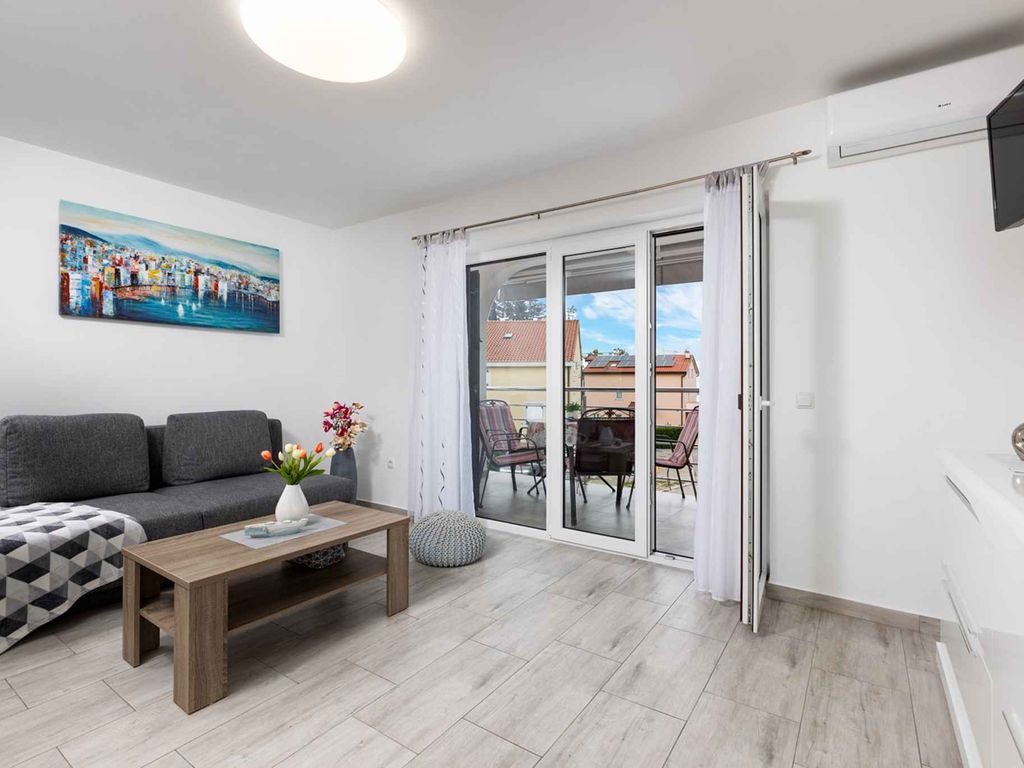 Ferienwohnung mit Klimaanlage und Balkon