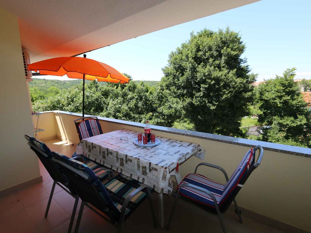 Ferienwohnung mit Balkon und Klimaanlage