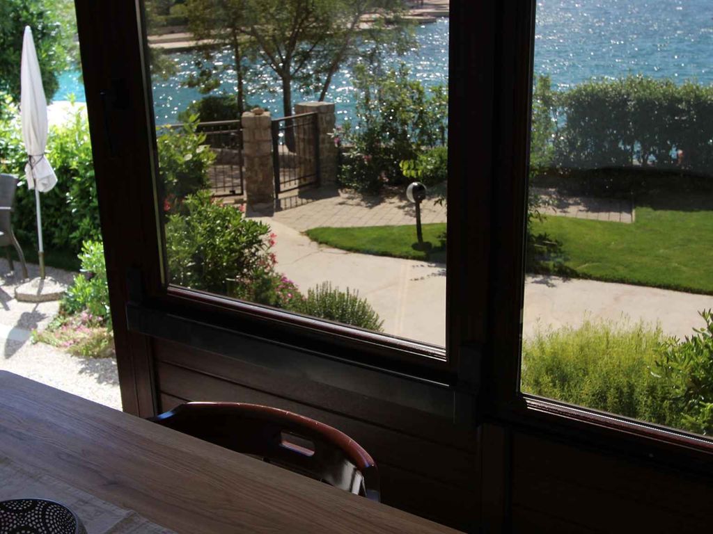 Ferienwohnung an der Küste mit Terrasse und Meerblick