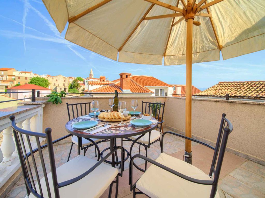 Ferienhaus mit Balkon