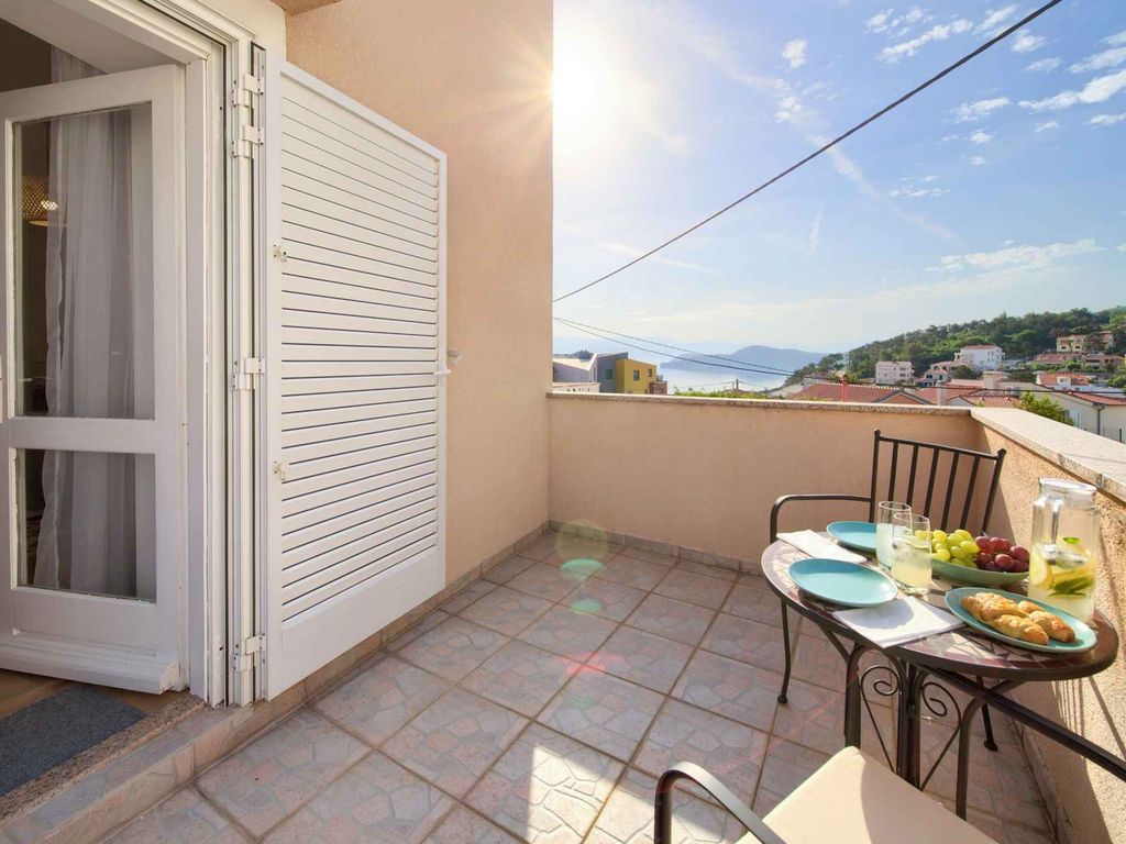 Ferienhaus mit Balkon