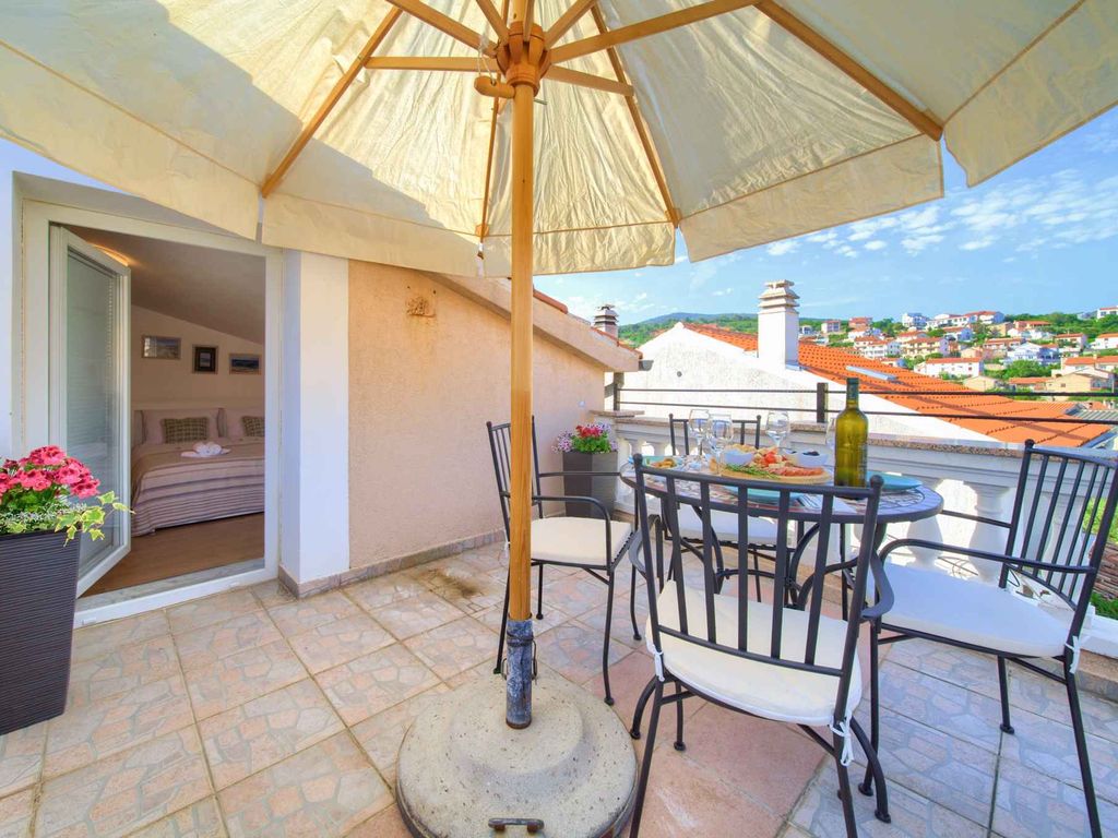 Ferienhaus mit Balkon