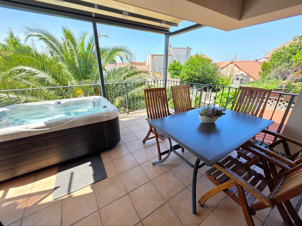 Ferienwohnung mit Garten und Klimaanlage