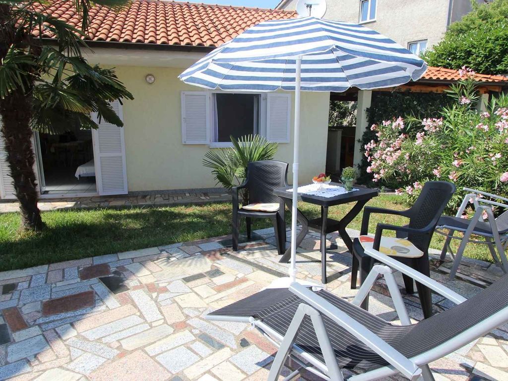 Bungalow mit Klimaanlage und Terrasse