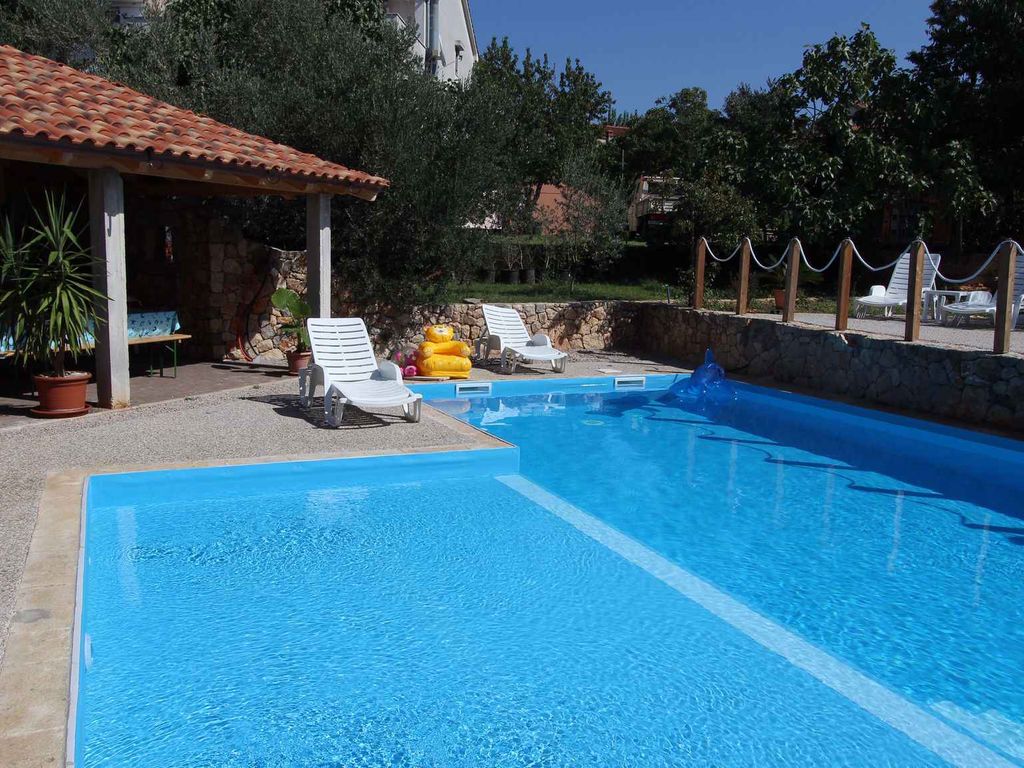 Ferienwohnung mit Pool und Meerblick