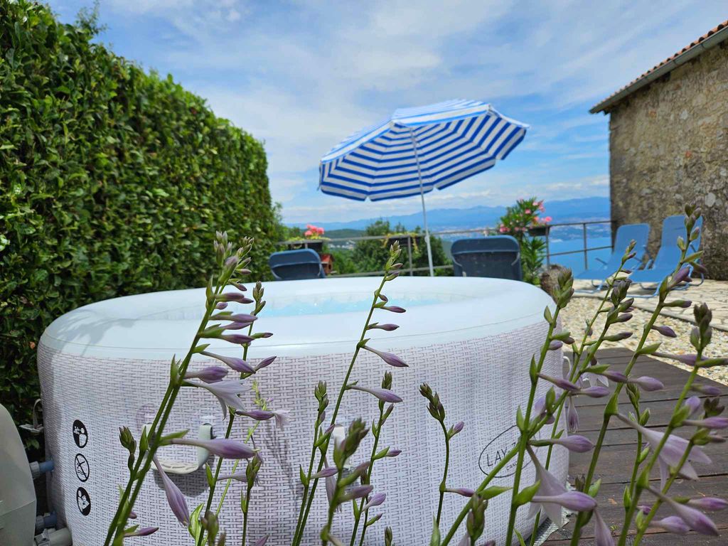 Ferienhaus mit Meerblick, Whirlpool und Grill