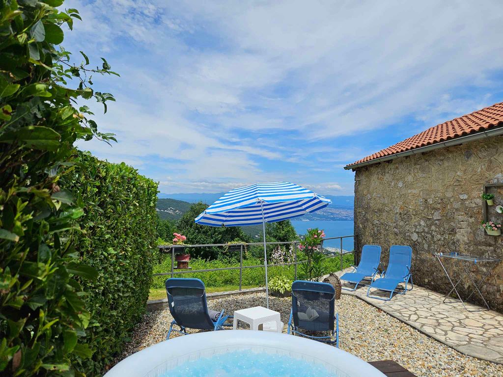 Ferienhaus mit Meerblick, Whirlpool und Grill