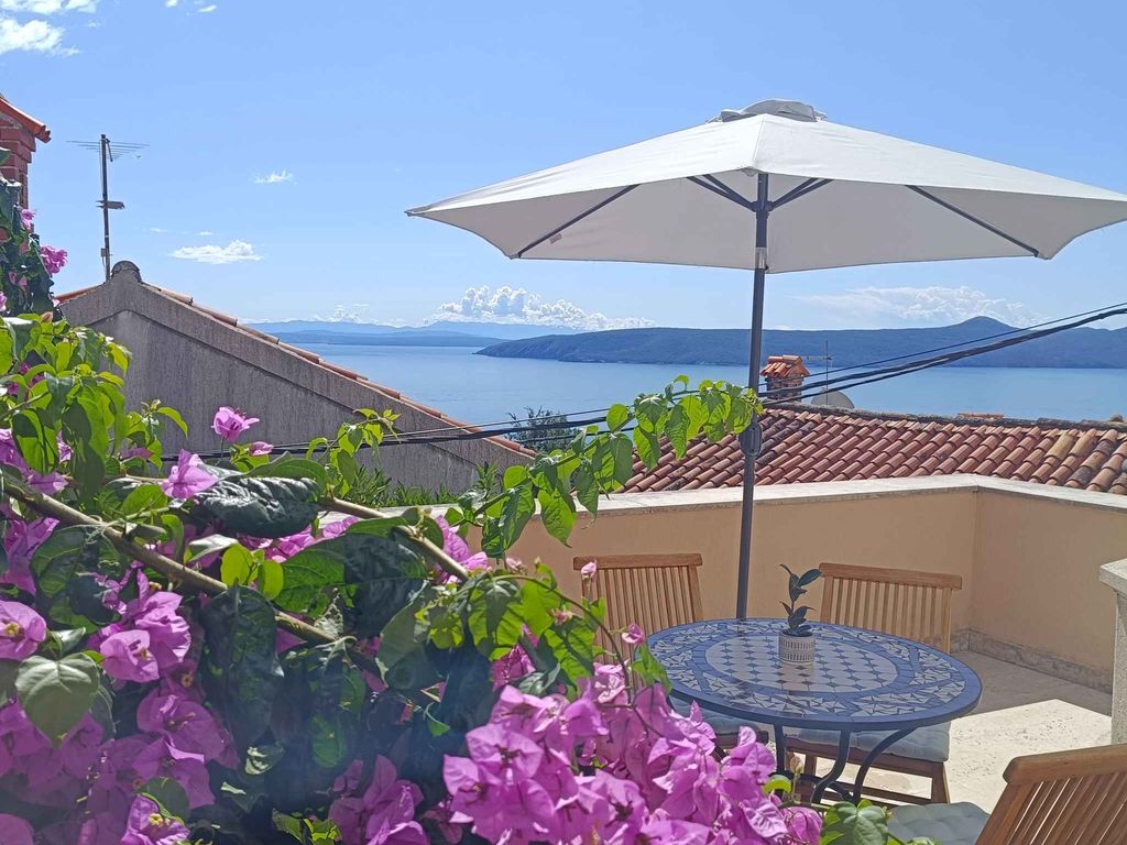 Ferienhaus mit Terrasse und Meerblick