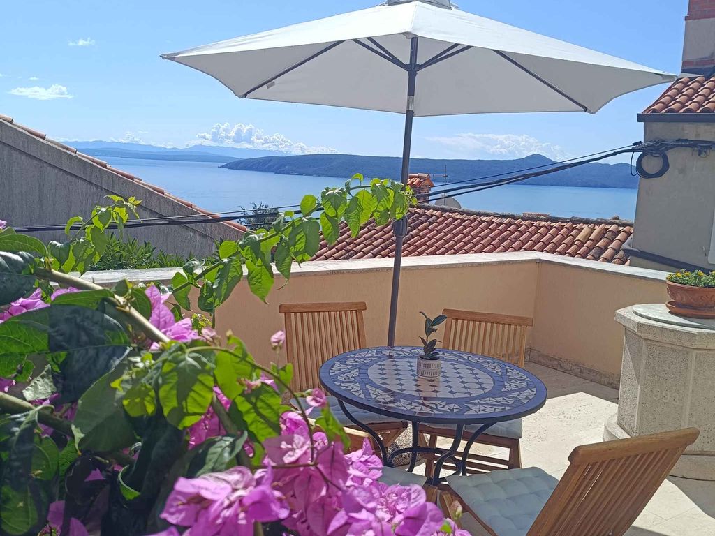Ferienhaus mit Terrasse und Meerblick