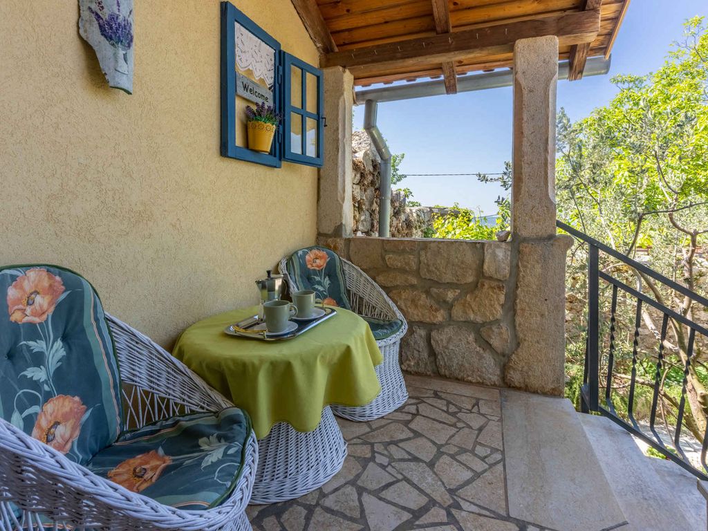 Ferienhaus mit großer Terrasse, Grill und Meerblick