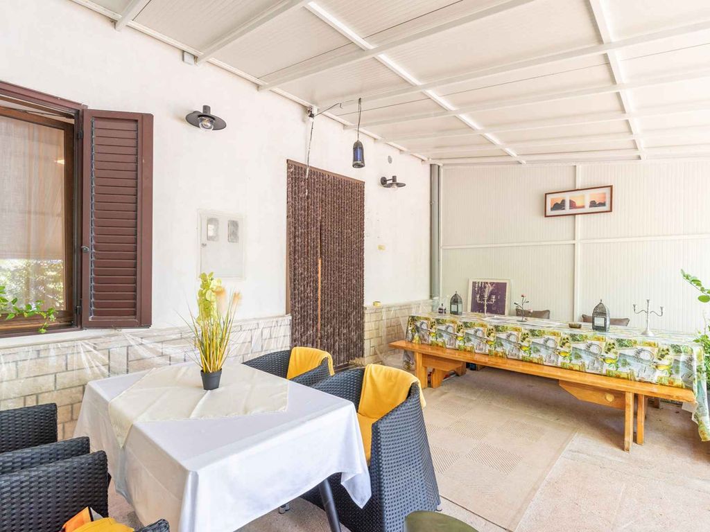 Ferienwohnung mit Gemeinschaftsgarten und Terrasse