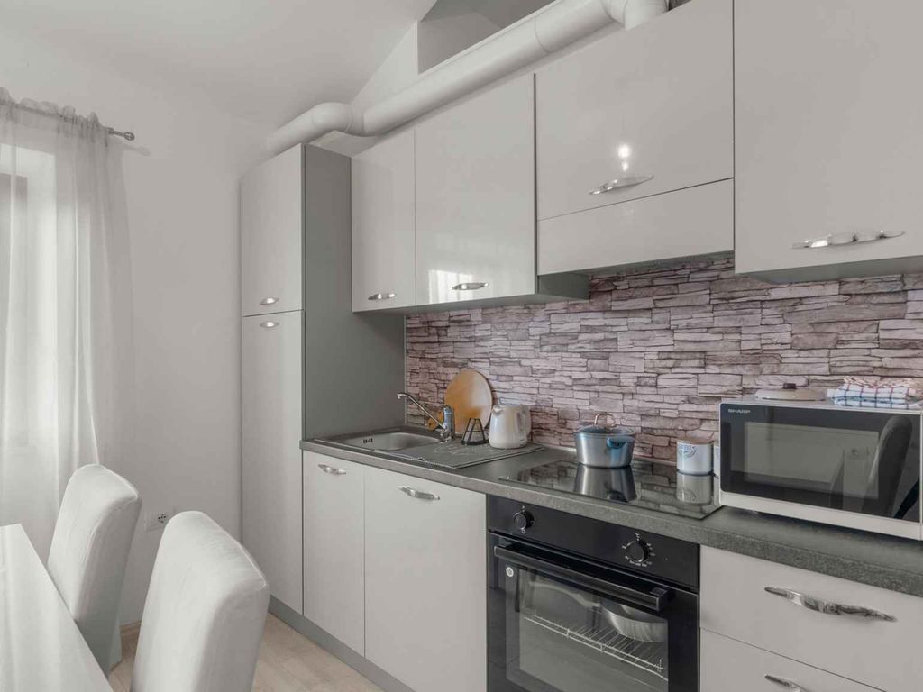 Ferienwohnung mit Gemeinschaftsgarten und Terrasse