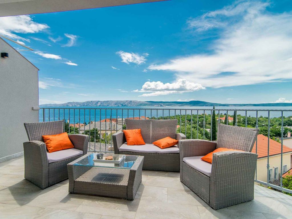 Ferienwohnung mit einem Balkon mit Blick auf das Meer