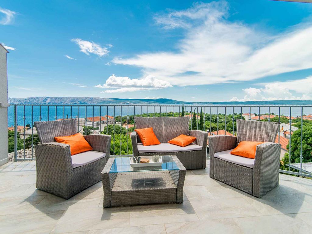 Ferienwohnung mit einem Balkon mit Blick auf das Meer