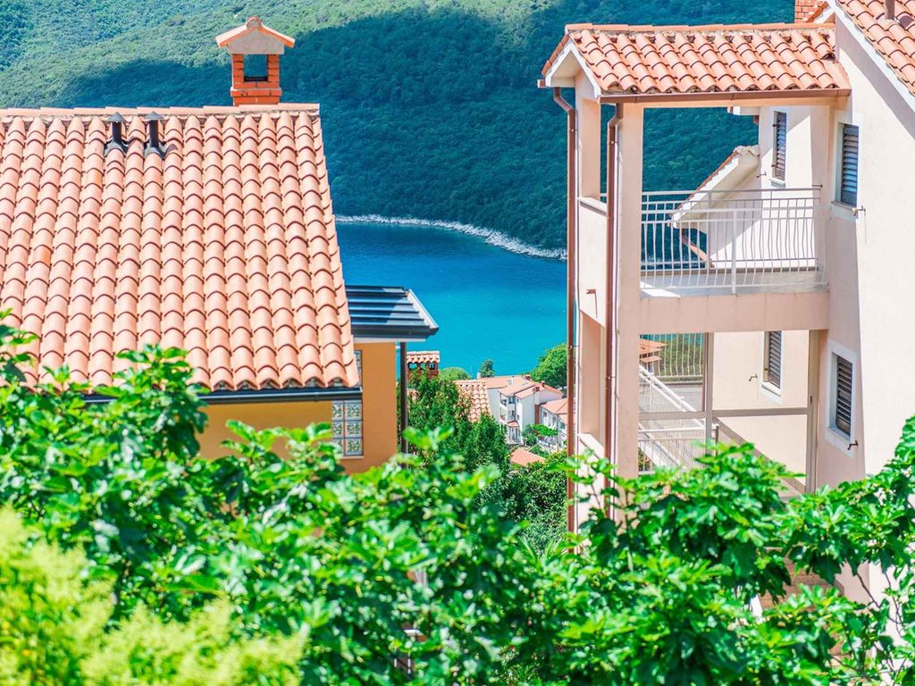 Apartment mit 1 Schlafzimmer mit Meer- und Gartenblick