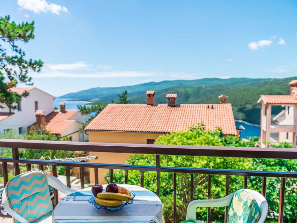 Apartment mit 1 Schlafzimmer mit Meer- und Gartenblick