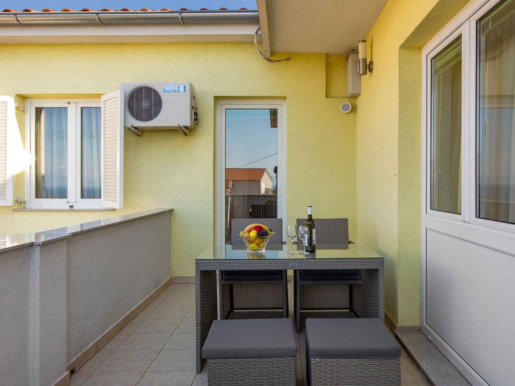 Ferienwohnung mit Balkon und Meerblick
