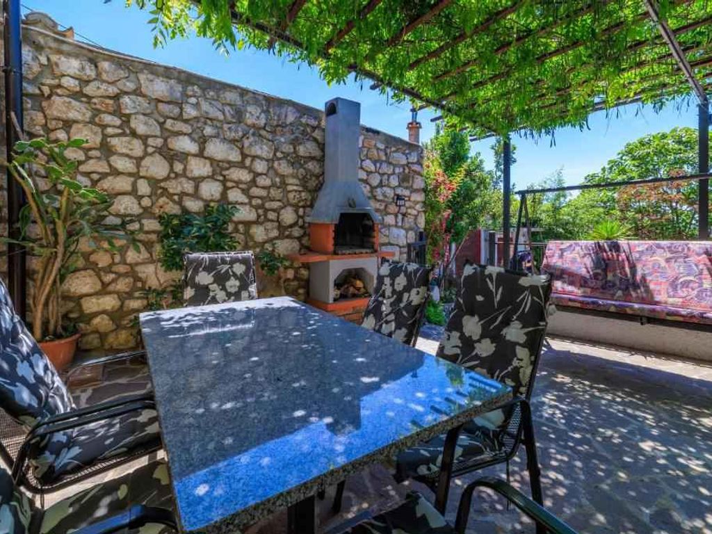 Ferienhaus mit Terrasse und Whirlpool