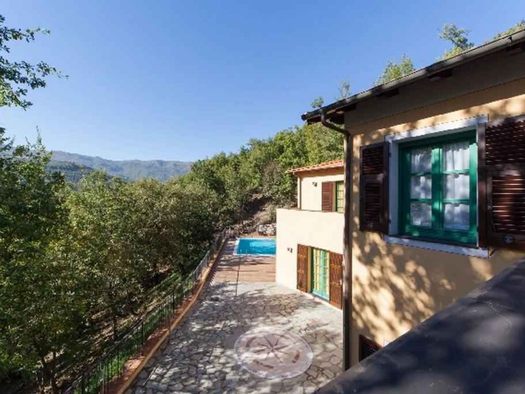 Ferienhaus mit Klimaanlage, Garten und Pool