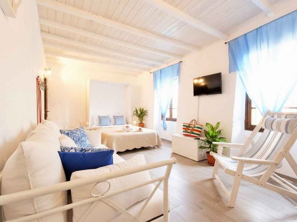 Ferienwohnung mit Klimaanlage und Dachterrasse mit Meerblick