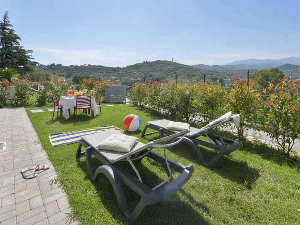 Ferienwohnung mit Klimaanlage, Terrasse und Pool