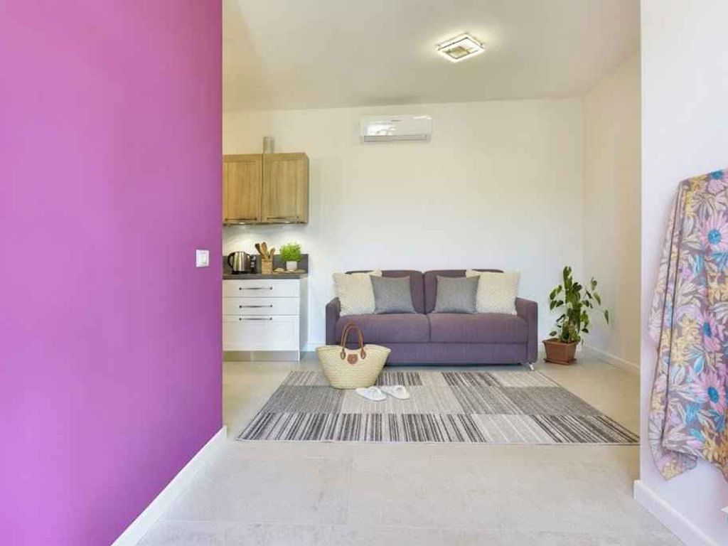 Ferienwohnung mit Klimaanlage, Terrasse und Pool
