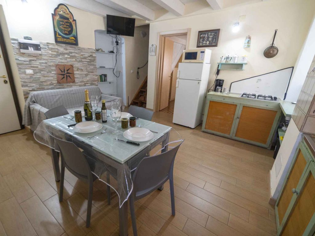 Ferienwohnung mit Klimaanlage und Dachterrasse mit Meerblick