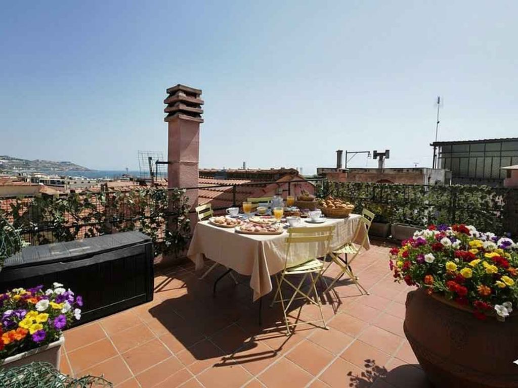 Ferienwohnung mit Klimaanlage und Dachterrasse mit Meerblick