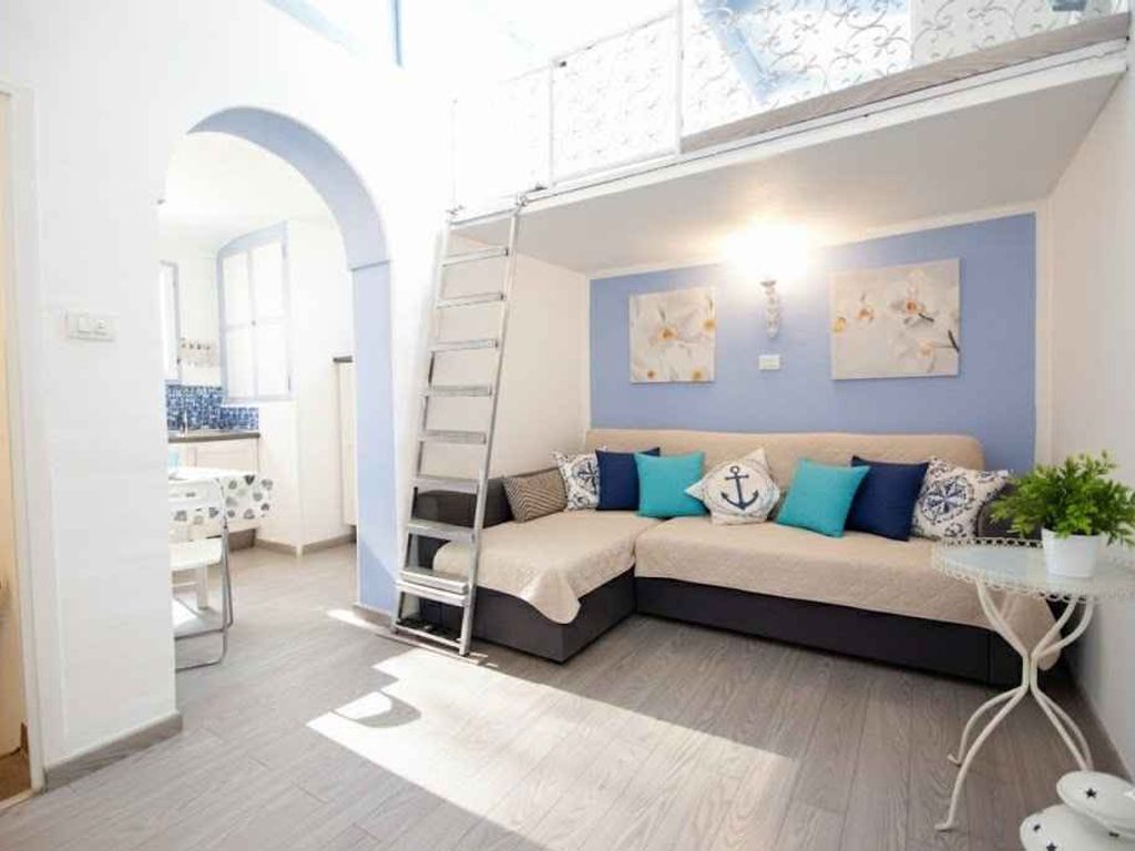 Ferienwohnung mit Klimaanlage und Dachterrasse mit Meerblick
