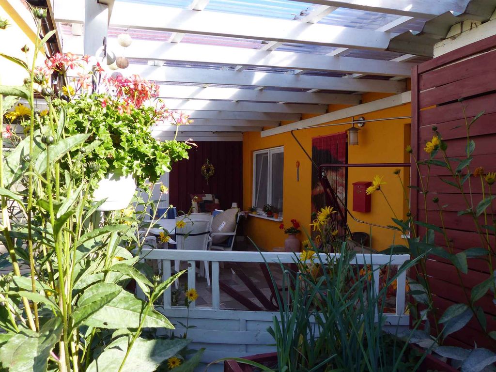 Ferienwohnung mit Kamin und überdachter Terrasse