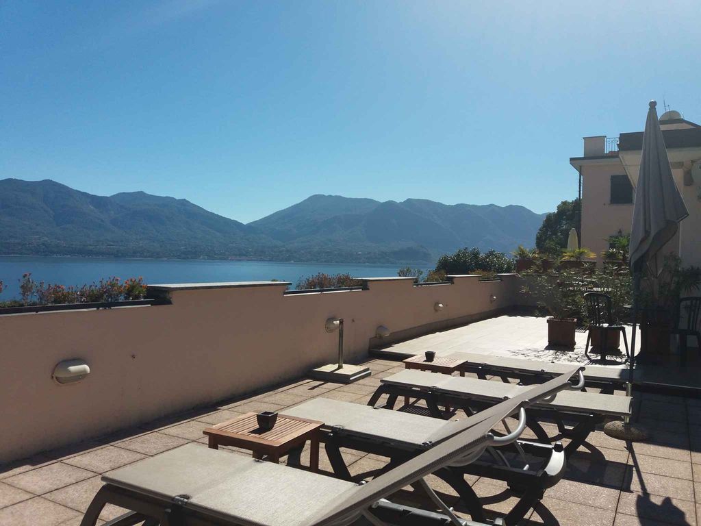 Ferienwohnung mit Balkon mit Seeblick, Privatstrand und Parkplatz
