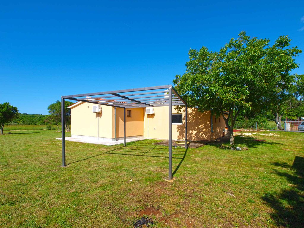 Ferienhaus mit Terrasse und Klimaanlage