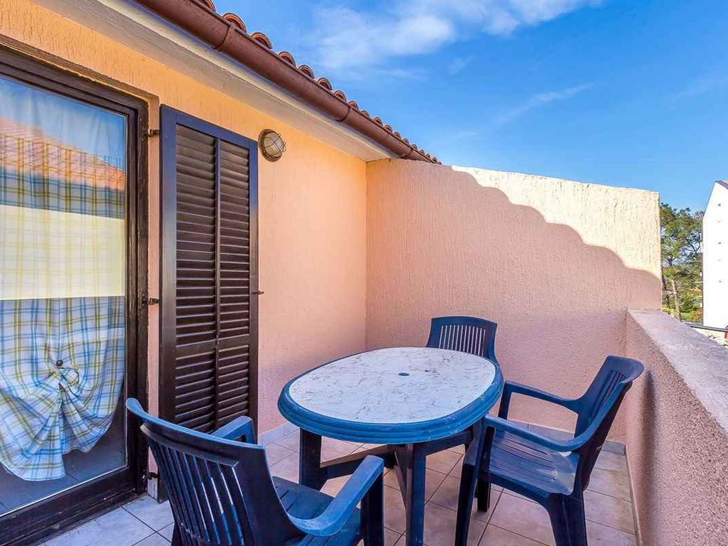 Ferienwohnung mit gemeinsamen Außen Swimmingpool und Balkon