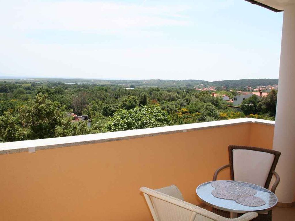 Ferienwohnung mit Balkon und Meerblick