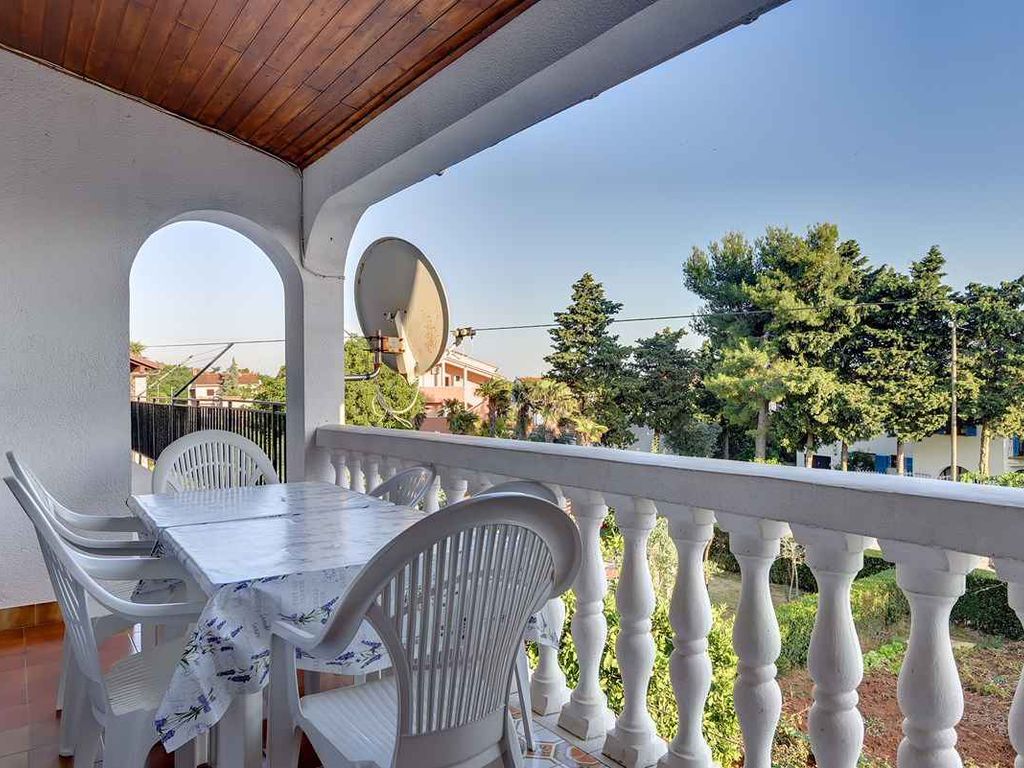 Ferienwohnung mit Terrasse und gemeinsamen Garten