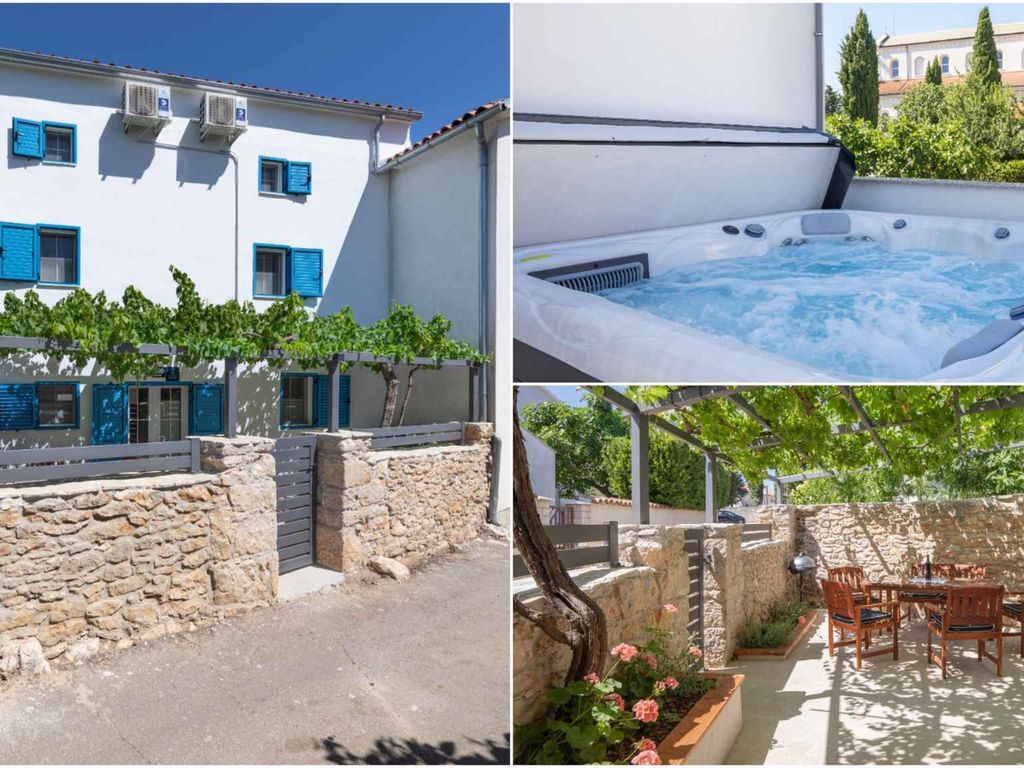 Ferienhaus mit Terrasse und Whirlpool